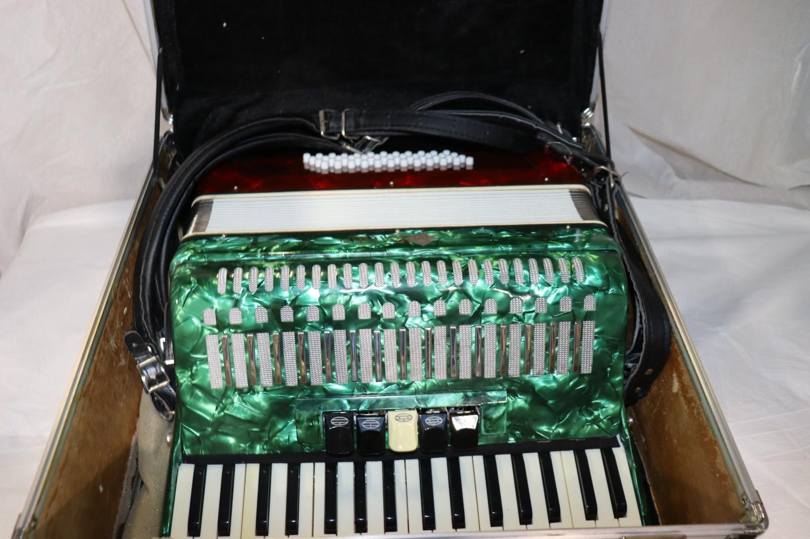 Mirage Accordian with Mexican Flag Colors, w/ Case, Used.