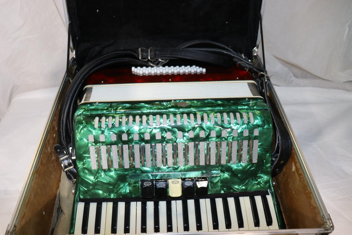 Mirage Accordian with Mexican Flag Colors, w/ Case, Used. - Northside Material Brokers