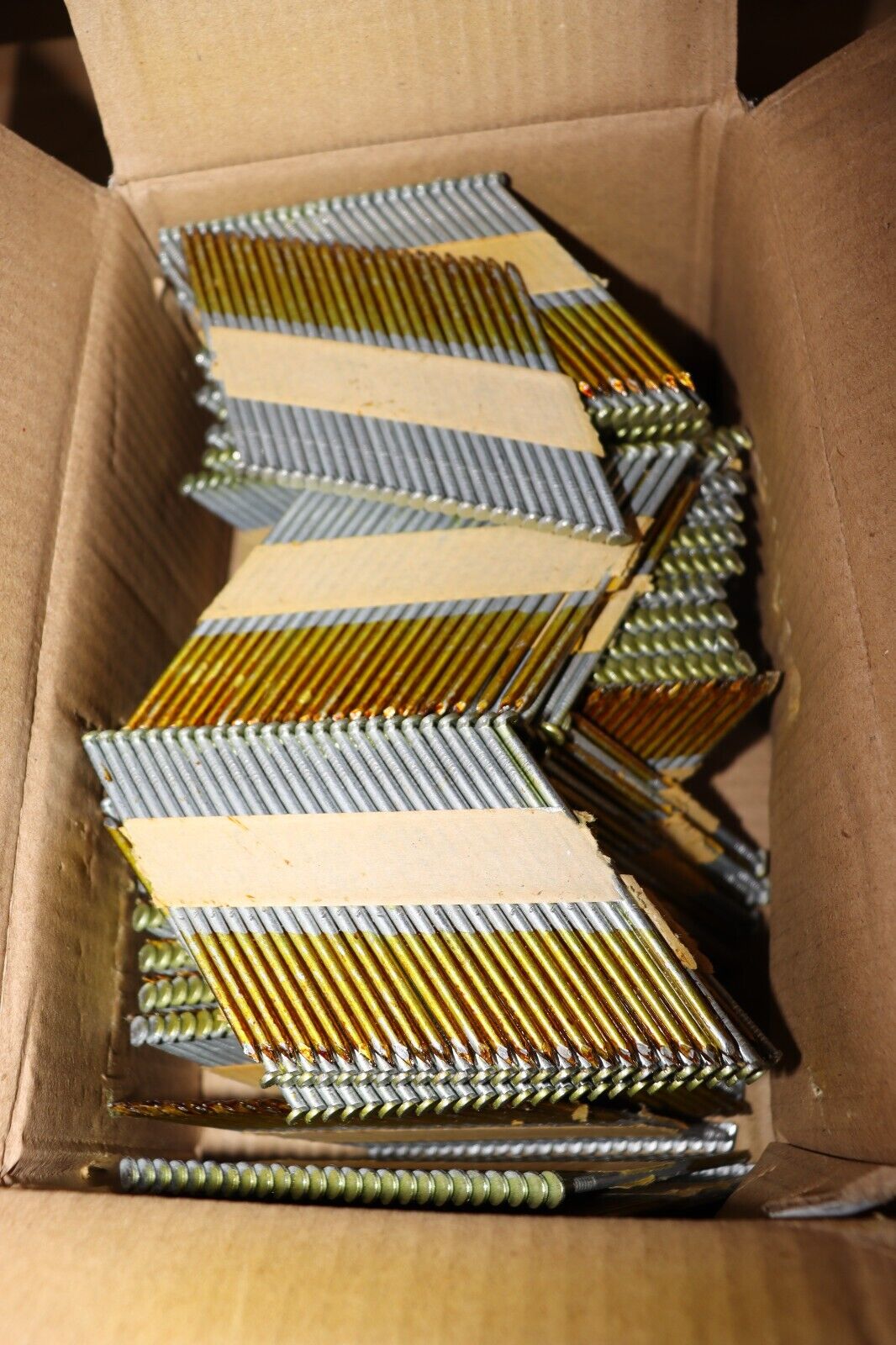Profit 3 1/4" x .120 Smooth Shank Nails, Paper Strip Collated, HDG 2000 pcs box - Northside Material Brokers